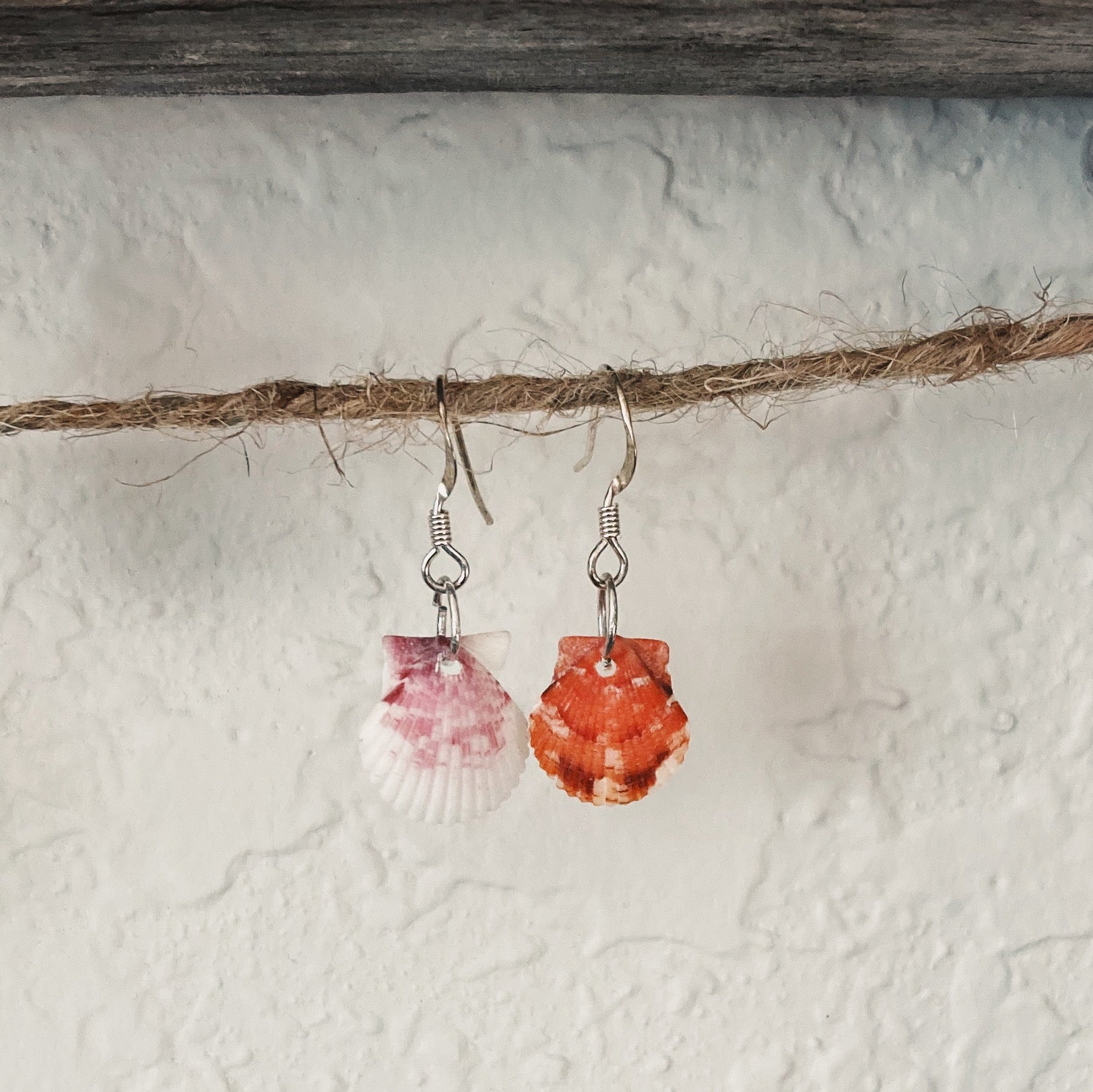 Small shell earrings, one pink and one orange sterling silver